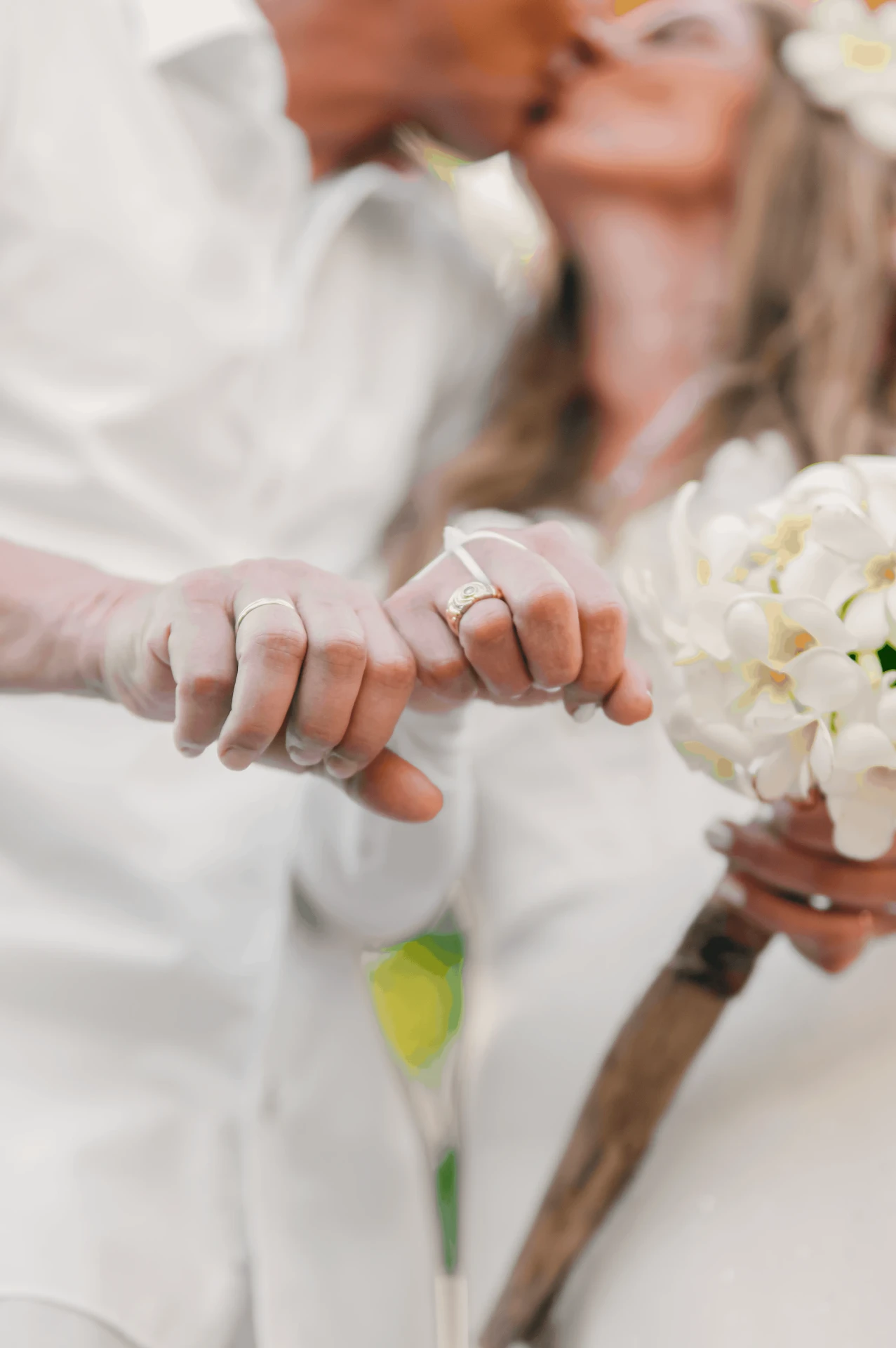 Detail of the couple's hands and wedding rings, wedding photography in Zanzibar